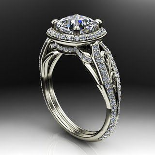 A white gold ring with a diamond in the center