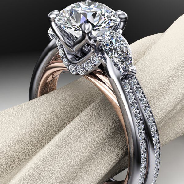 A close up of a diamond ring on a napkin