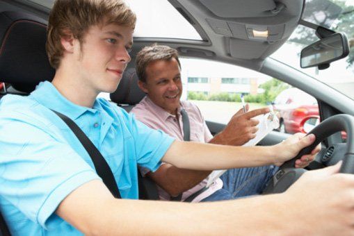 Teenage boy taking a Driving Lesson - - Driving School Services in Princeton, NJ