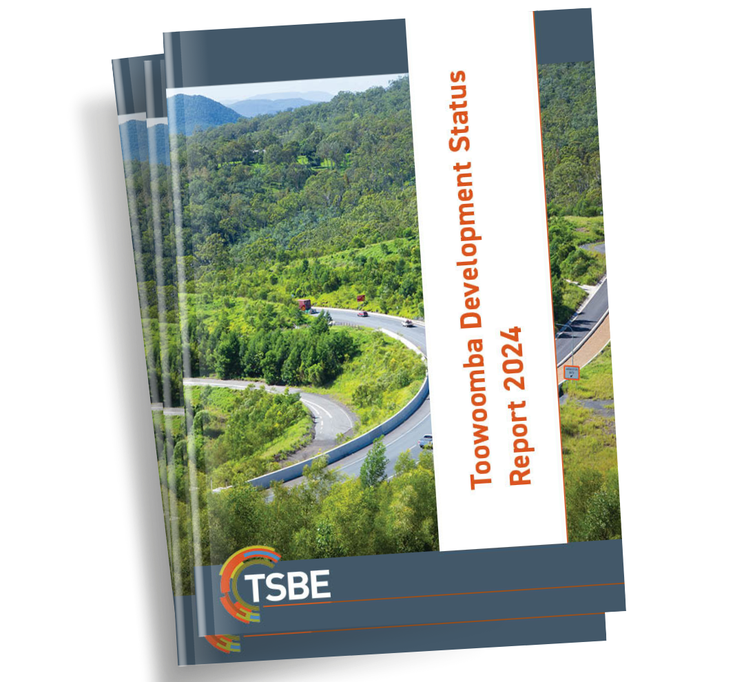 A book with a picture of a road and trees on the cover