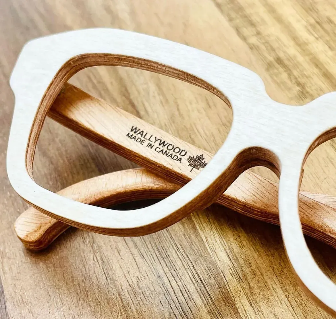 A pair of wooden glasses made in canada