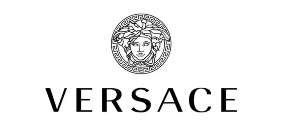 A black and white logo for versace with a woman 's head in a circle.