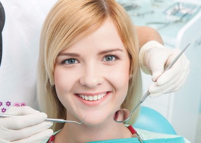 Woman in at the orthodontist's for a treatment