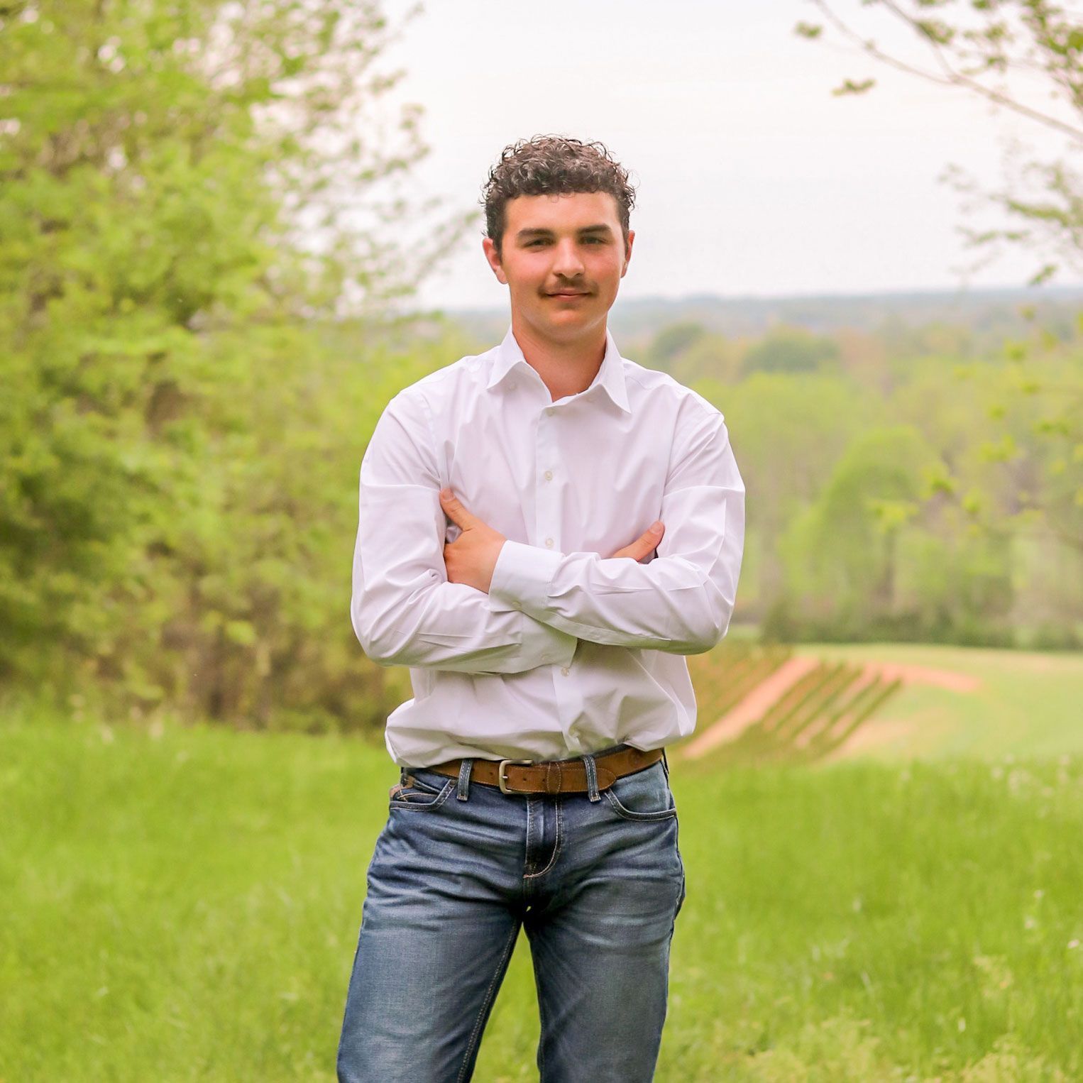 a woman is holding a potted plant in front of a sign that says `` take over '' .