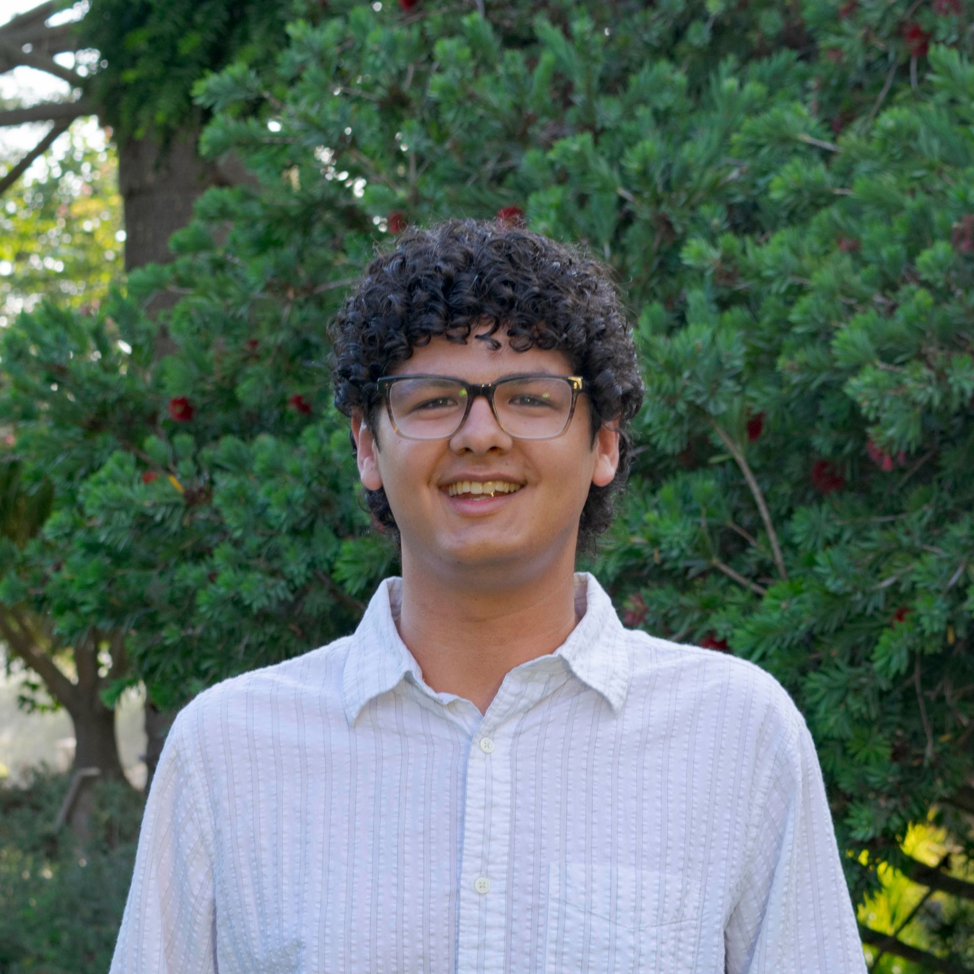 a woman is holding a potted plant in front of a sign that says `` take over '' .