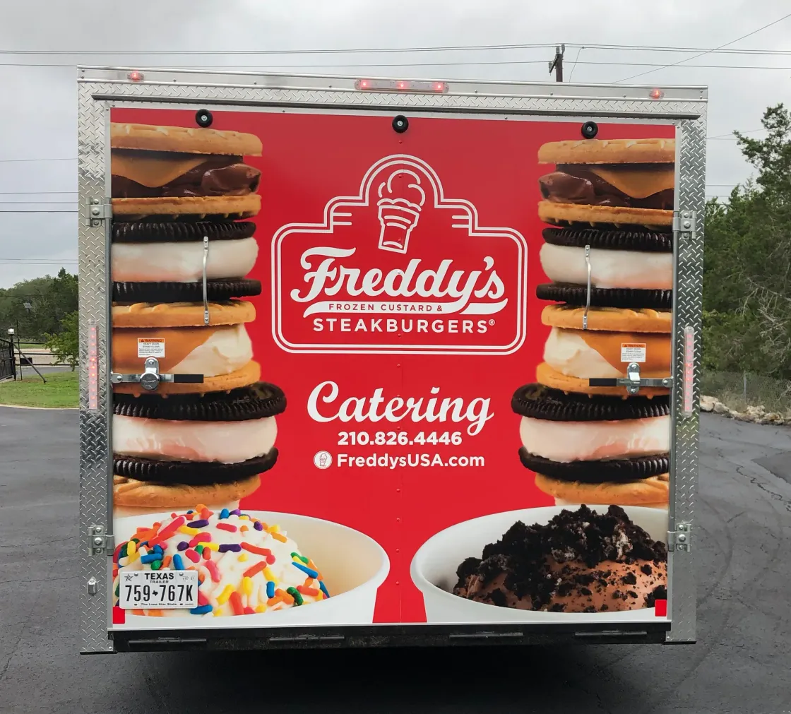 The back of a freddy 's steakburgers trailer