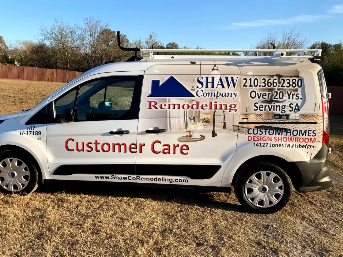 A white van that says customer care on it