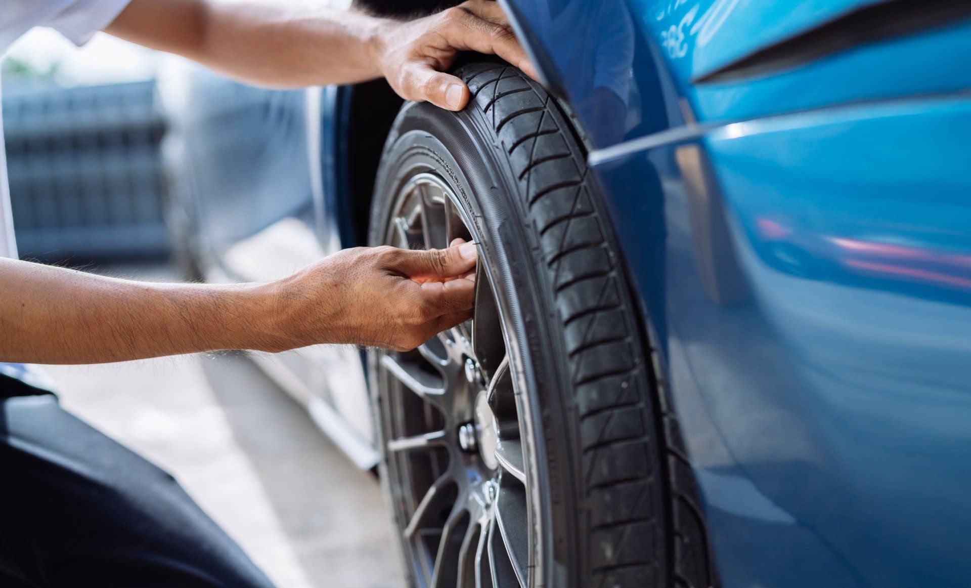 Mechanic Checking the Car Tire — Merriam, KS — Gooddeal Auto Service LLC