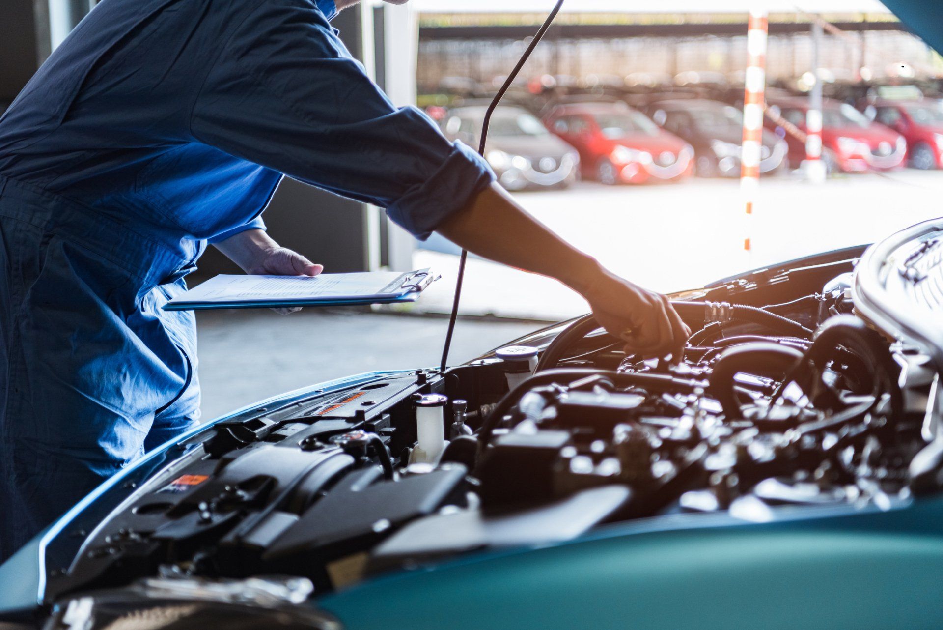 Mechanic Checking Car Wirings — Merriam, KS — Gooddeal Auto Service LLC