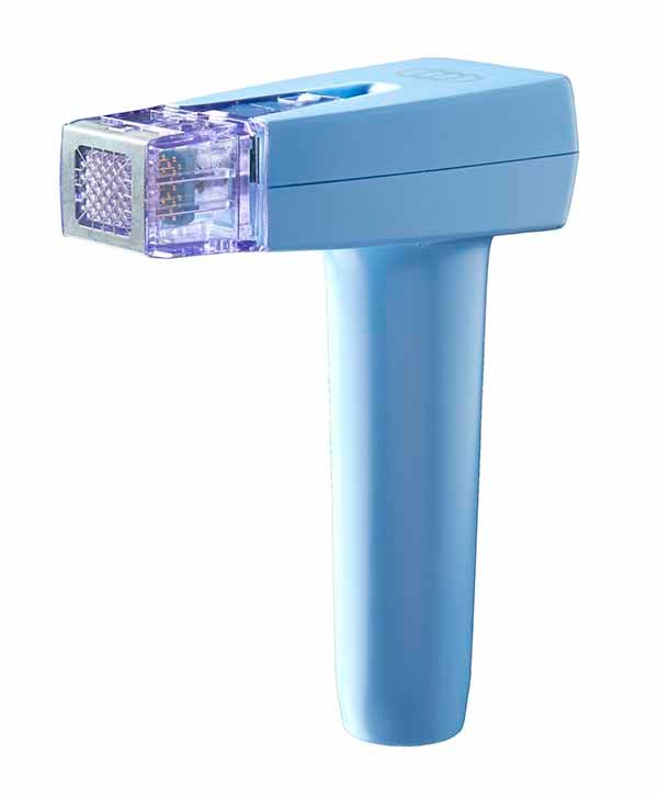A blue hair removal device is sitting on a white surface.