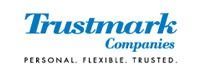 Trustmark Companies logo with blue text on white background: "Trustmark Companies" above "PERSONAL. FLEXIBLE. TRUSTED."