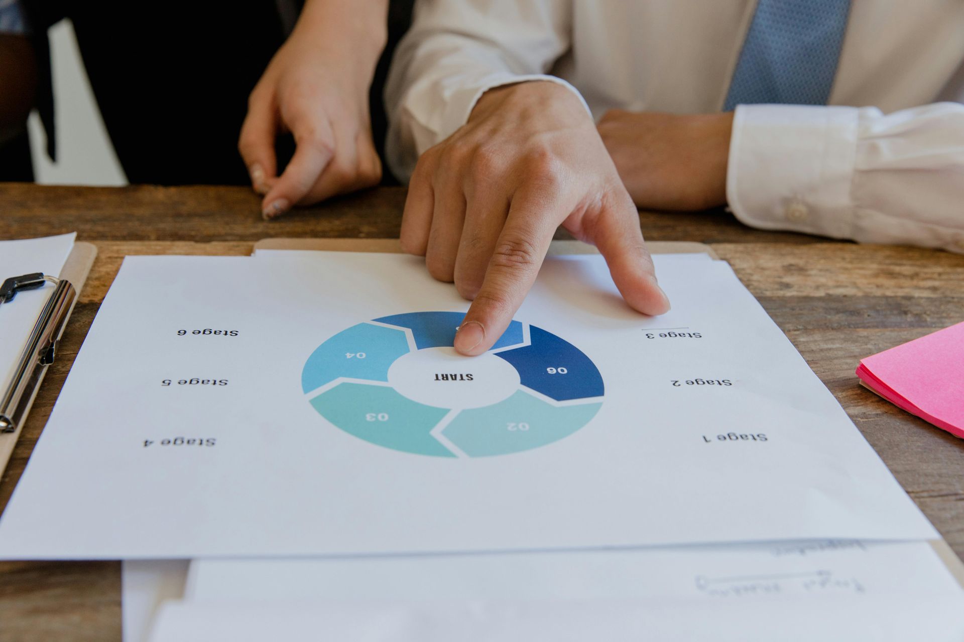 A row of shops are lined up on the side of a street.