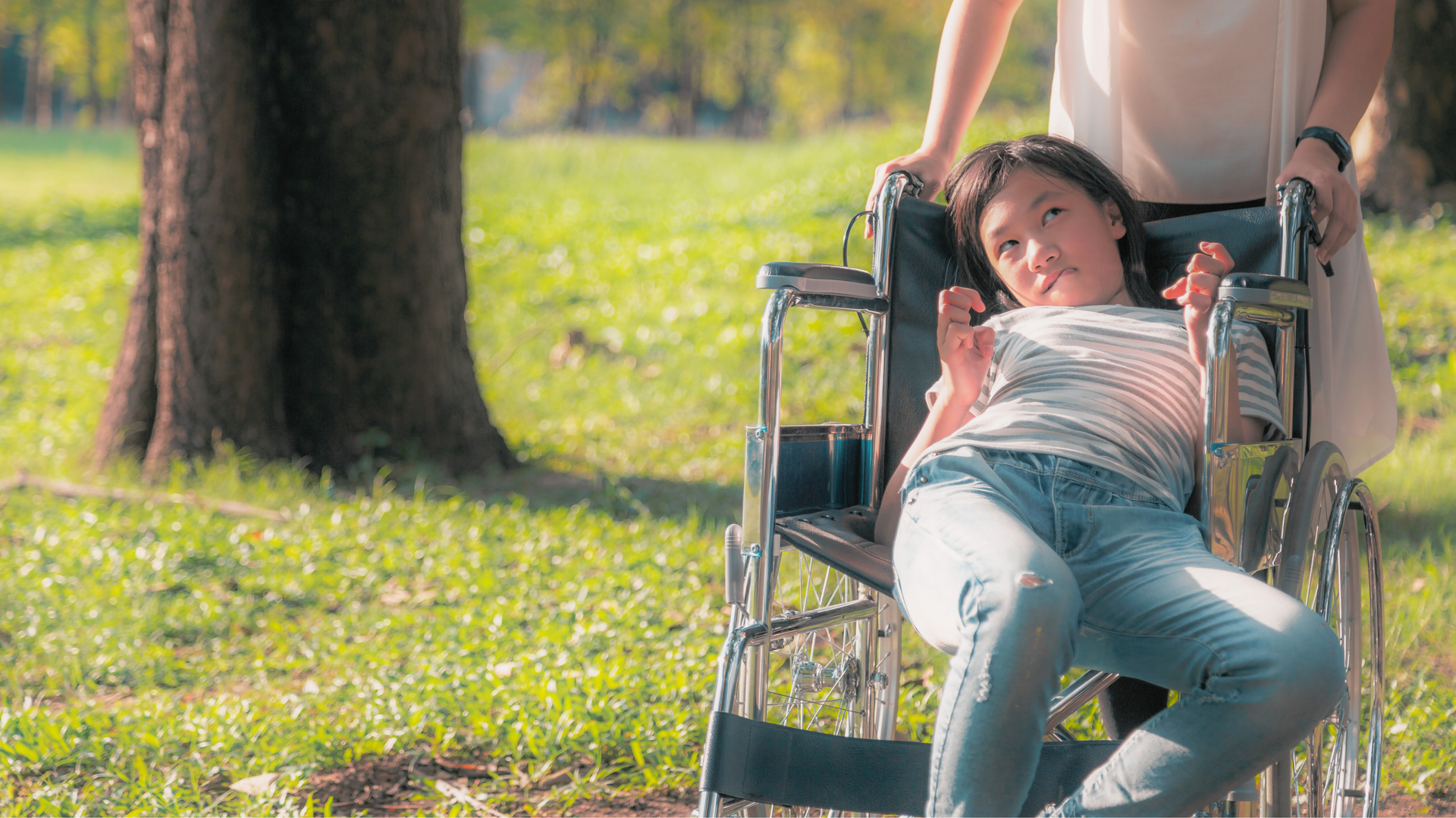 Young Hope House resident enjoying a moment of joy in a supportive care environment