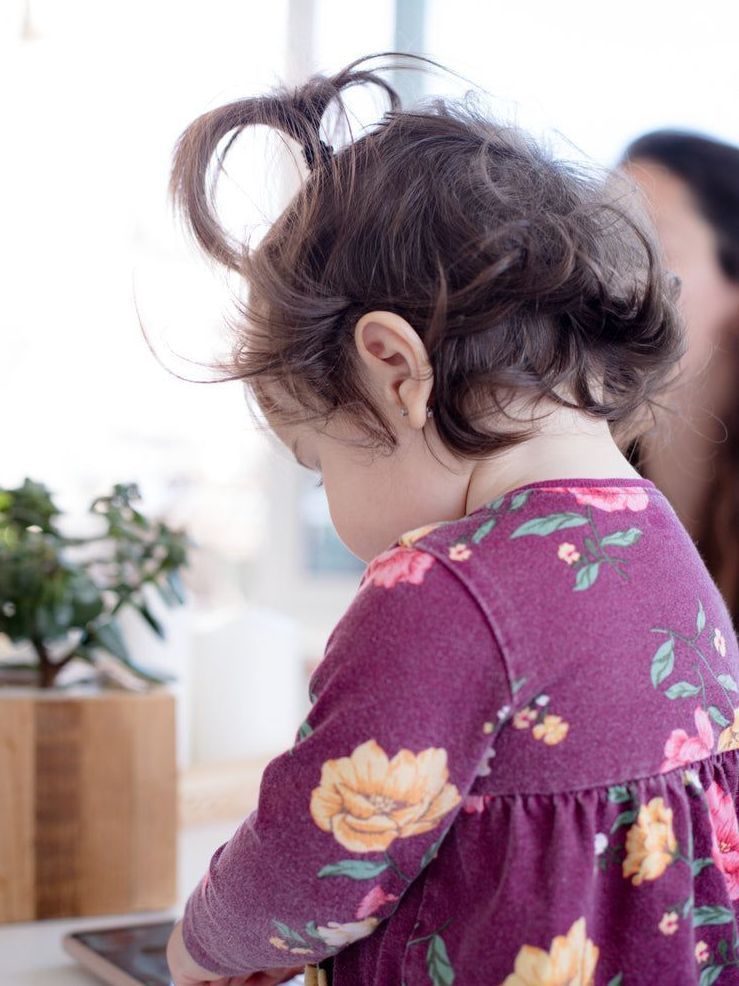 Happy young resident of Hope House captured in a candid moment of joy