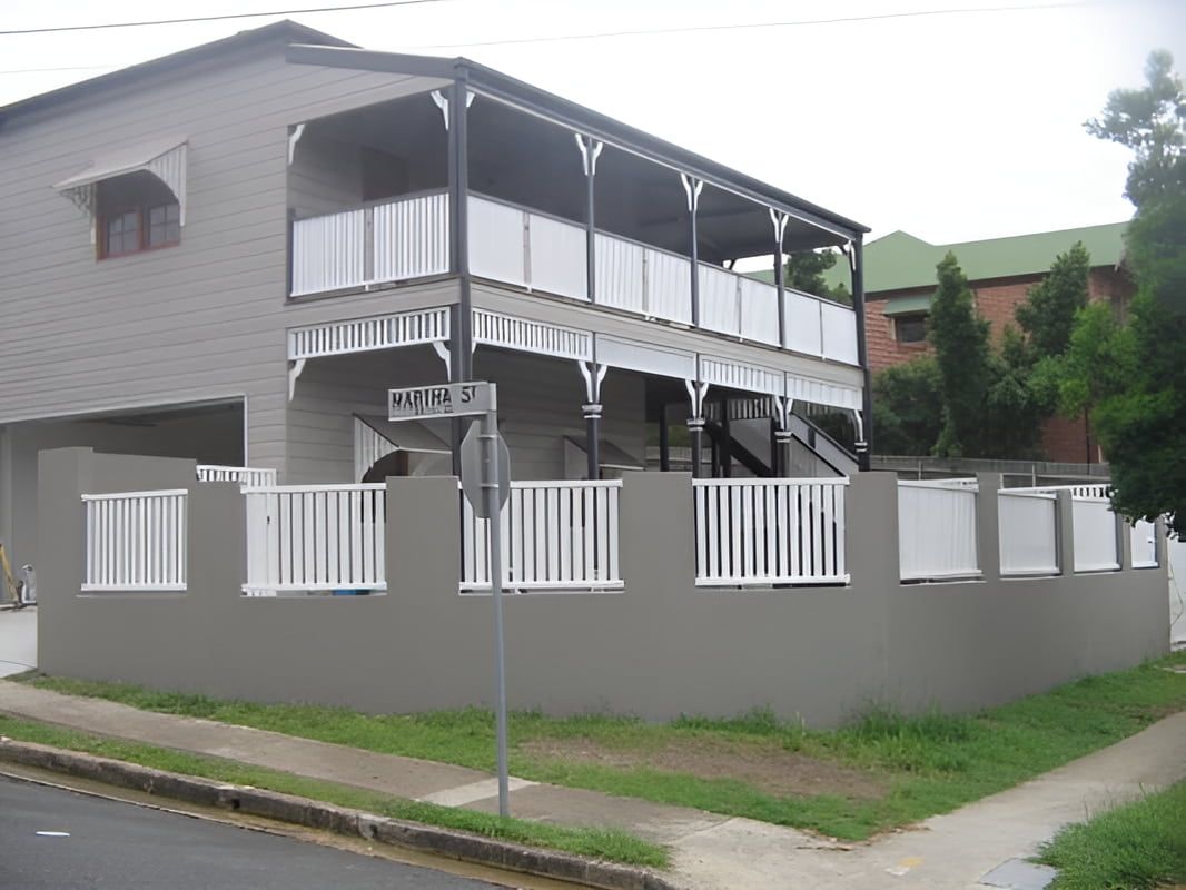 A Grey House With A Matching Grey Fence — Aliweld Fabrications In Caloundra West, QLD