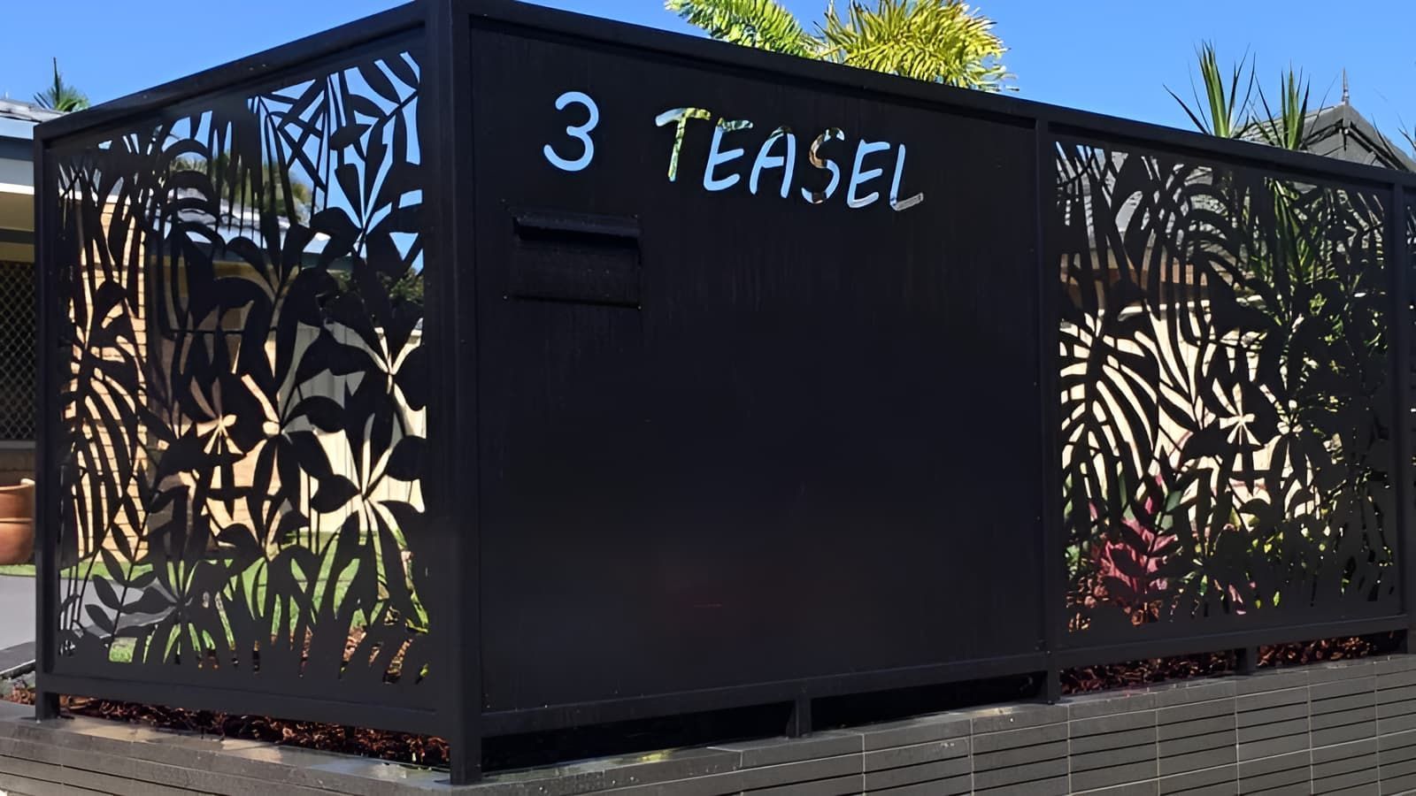 A Black Fence With The Number 3 Written On It — Aliweld Fabrications In Caloundra West, QLD
