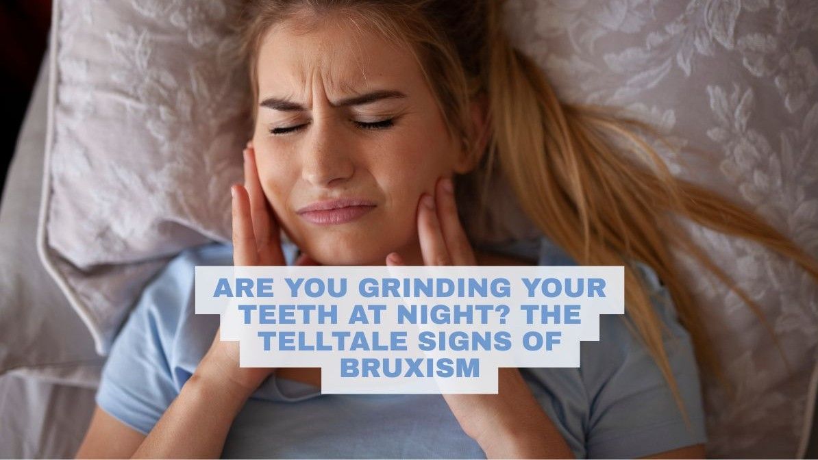 A woman grinds her teeth while in bed sleeping 