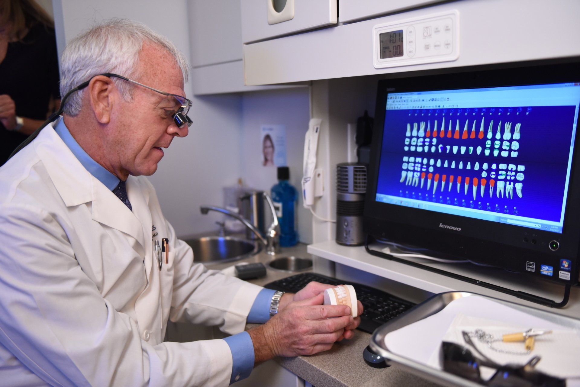 smiling woman while visiting the dentist