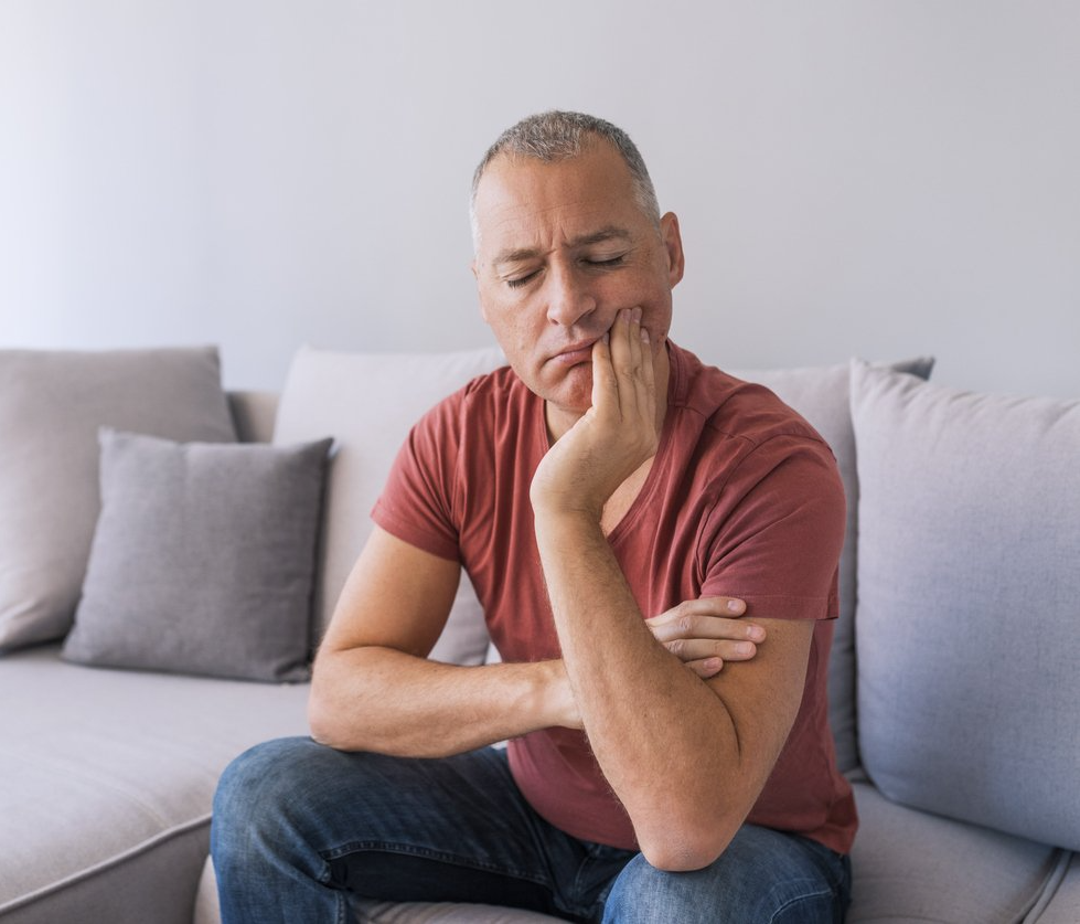 man with teeth pain
