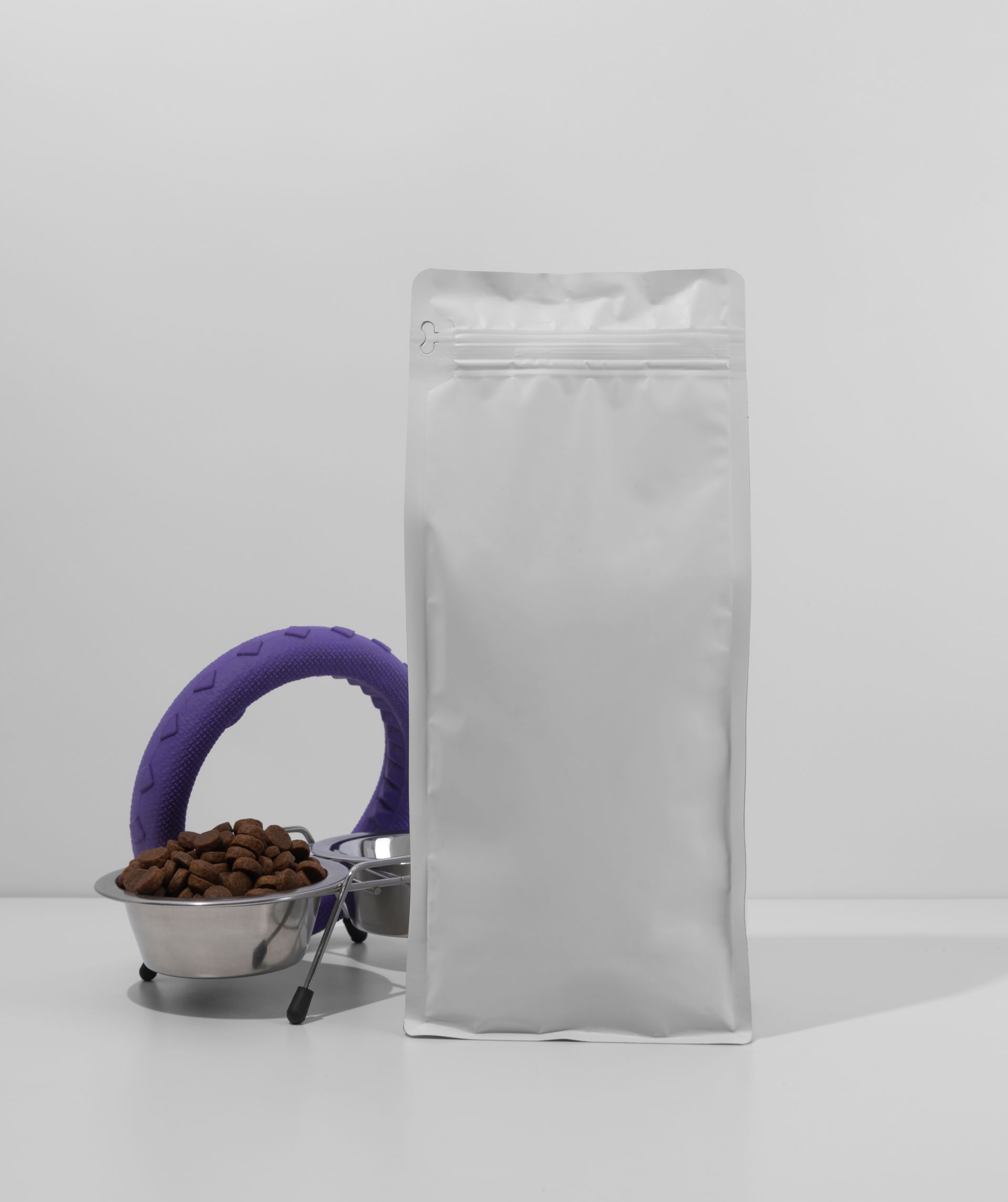 A group of people are looking at a computer screen in an office.