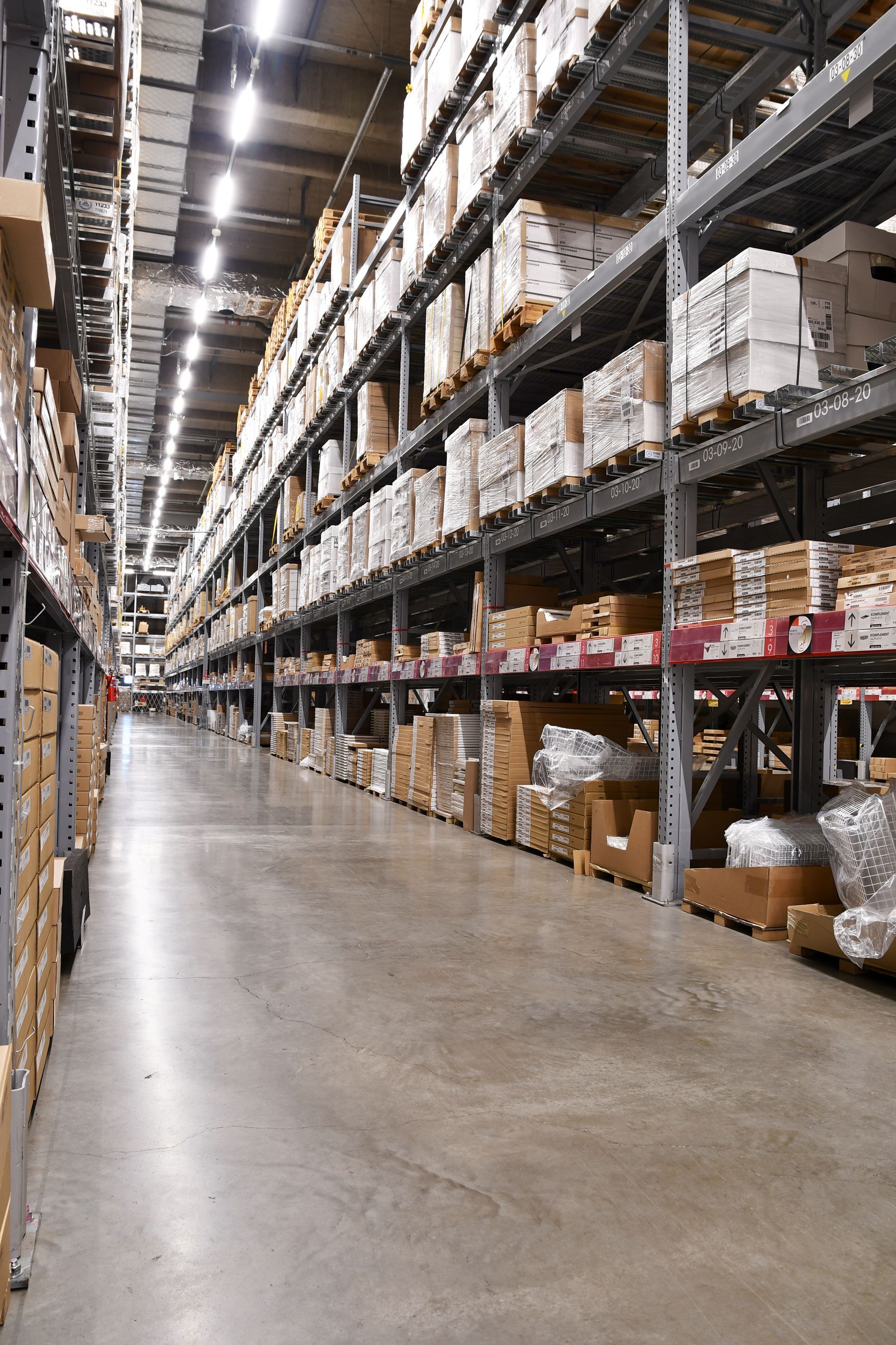 A group of people are looking at a computer screen in an office.