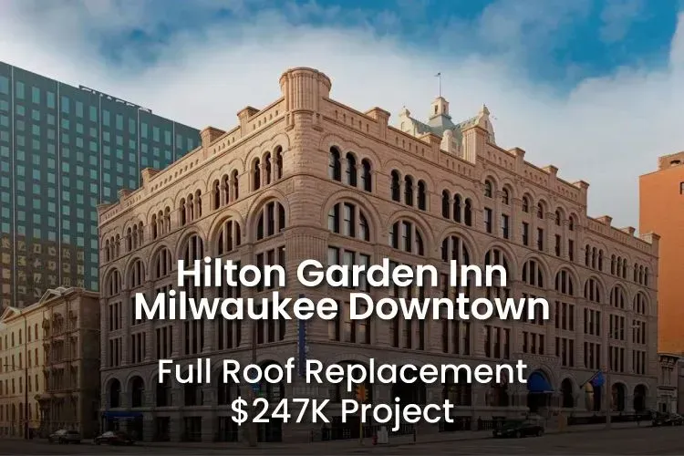 Hilton Garden Inn Milwaukee Downtown building with text about a full roof replacement project.