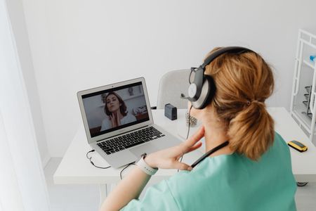 Doctor and patient during telehealth session