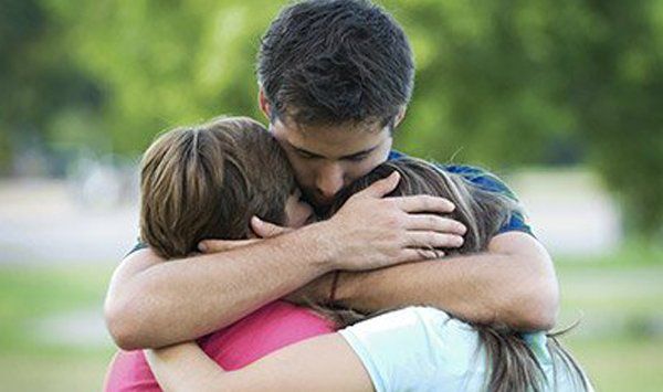 Man hugging children — Wallingford, CT — Alternative Paths Consulting LLC