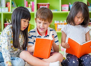 Toddler Daycare — Children Reading Books in Phenix City, AL