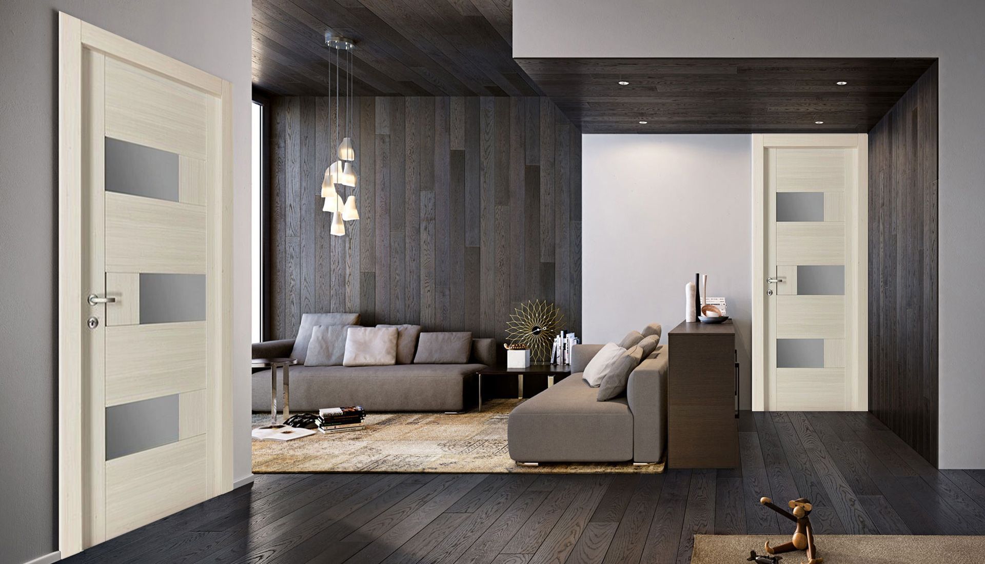 Un soggiorno con un divano e due porte bianche