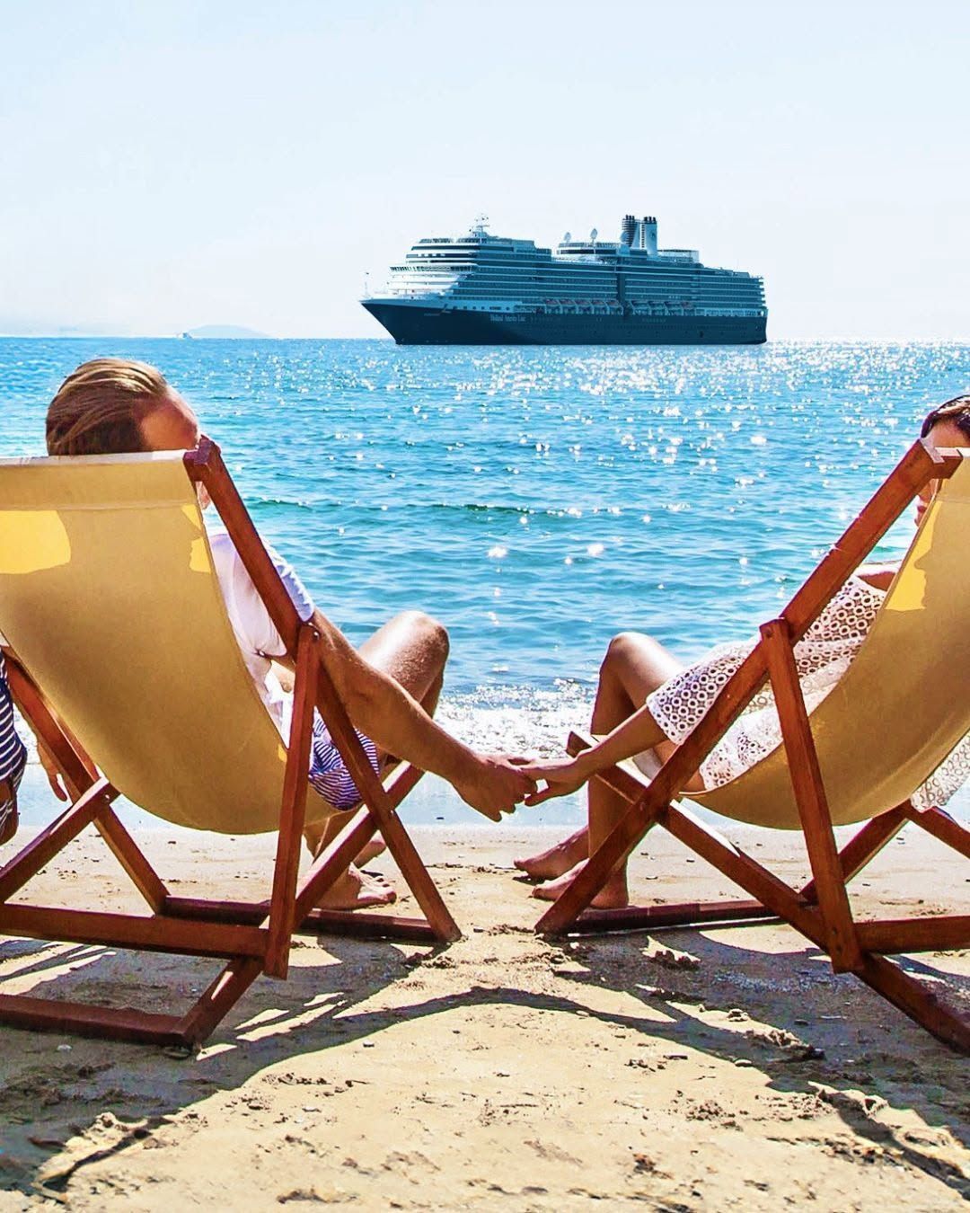 Two beach chairs on sand facing a blue ocean with a cruise ship on the horizon.