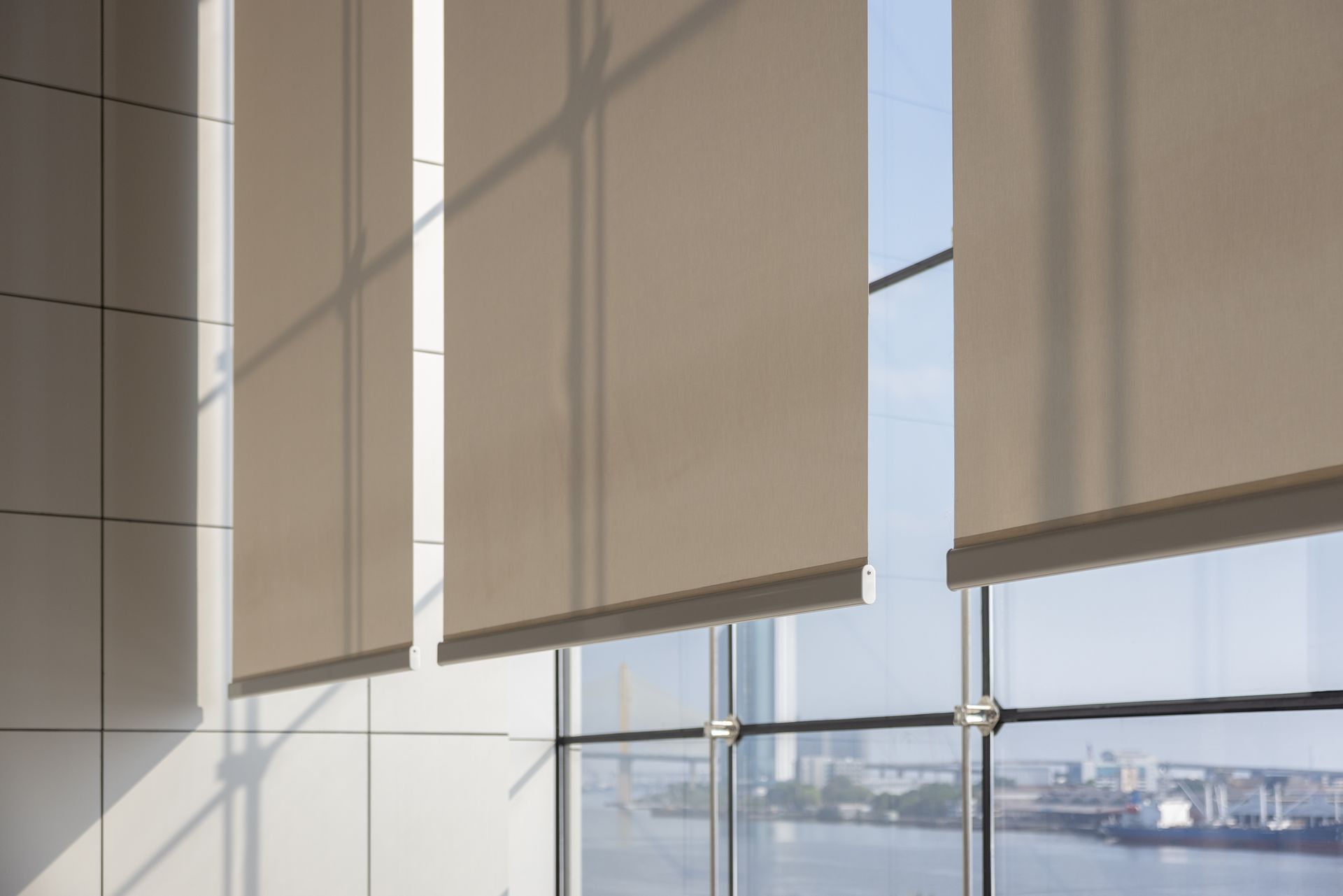 A playground in front of a building with a lot of buildings in the background.
