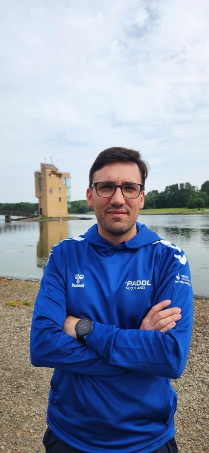 Logo for Paddle Scotland: blue text on white background, with 