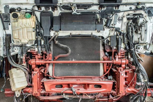 An opened front side of a truck. An opened front side of a truck.