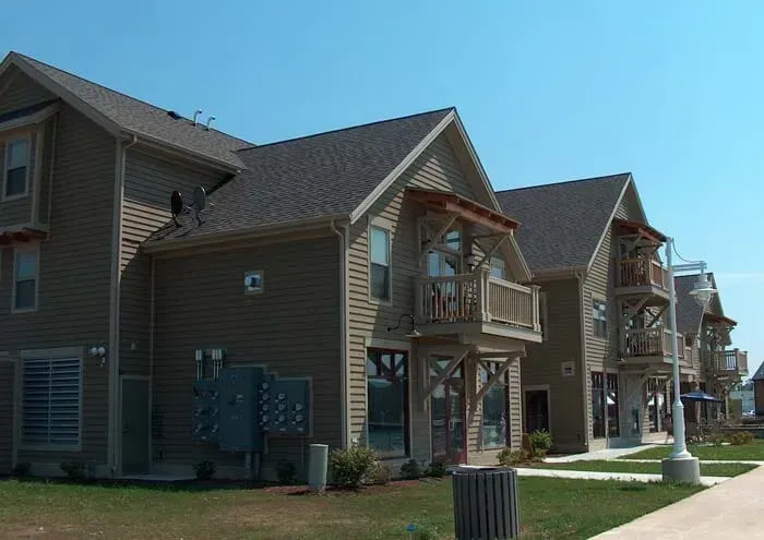 A Row of Apartment Buildings with Balconies on A Sunny Day | Sheboygan, WI | Elite Builds