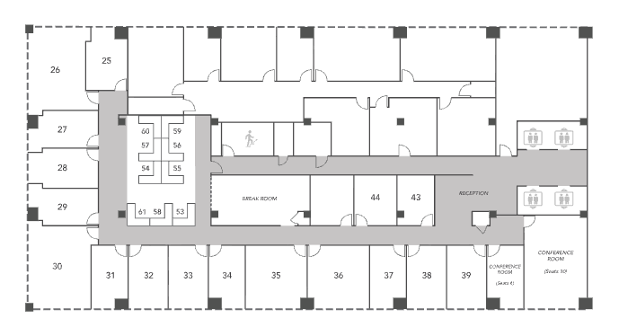 Floor plan of an office building with numbered rooms, hallways, and restrooms.