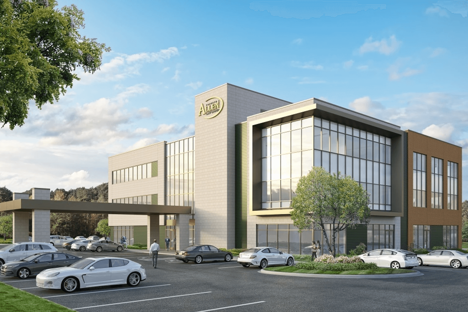 Modern office building with parked cars, a covered entrance, and the word