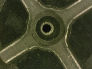 undamaged valve plate under microscope