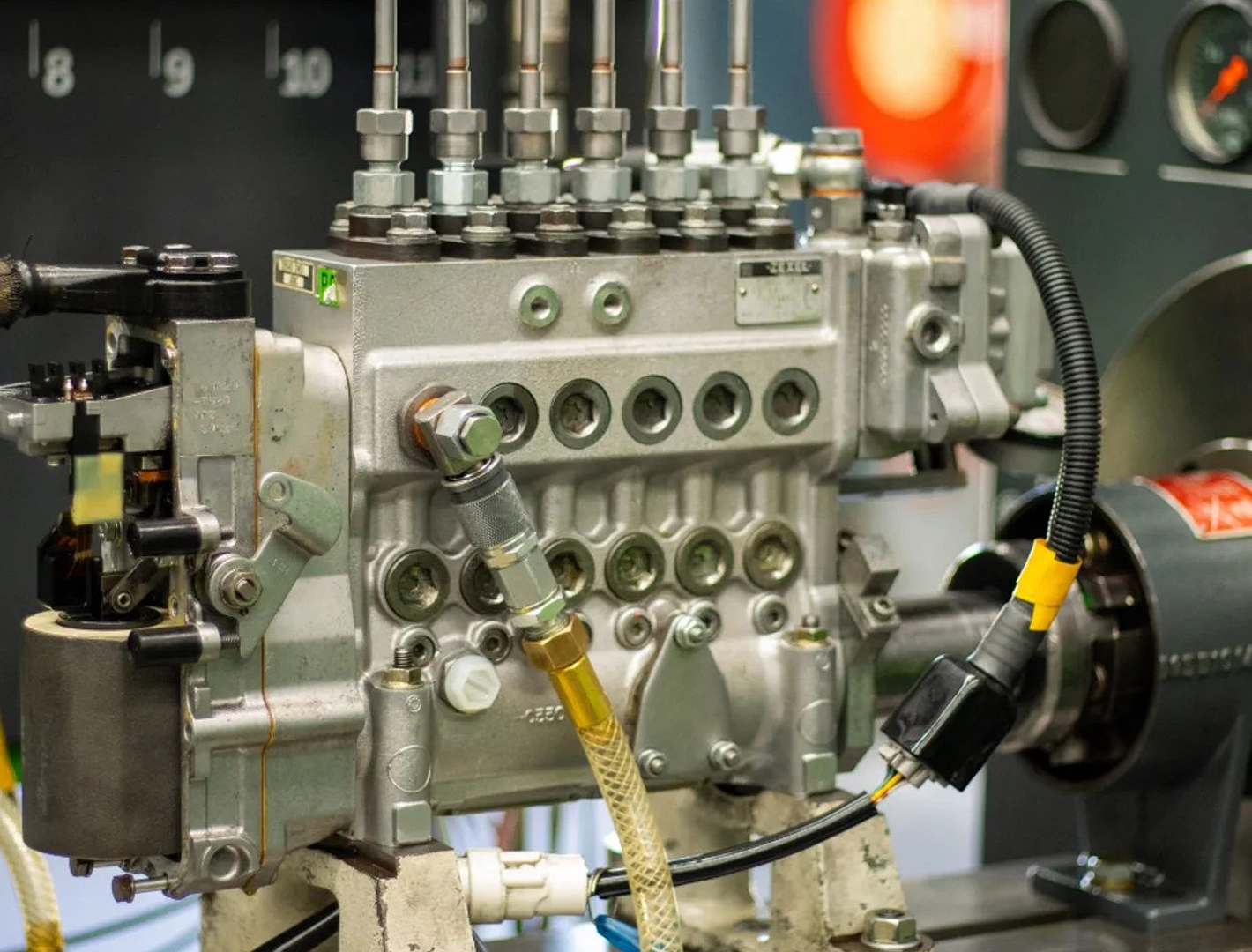 A close up of a fuel pump on a machine.