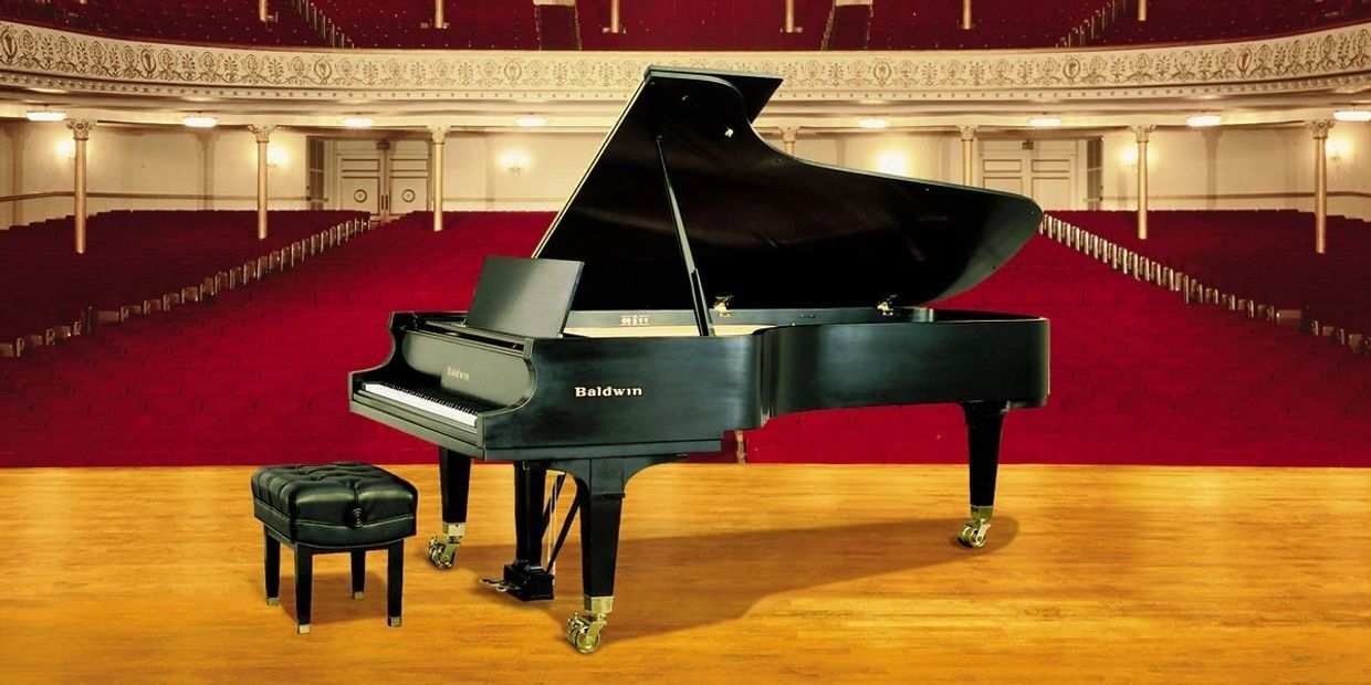 Baldwin Piano On A Stage — Midlothian, VA — Peabodys Piano Co.