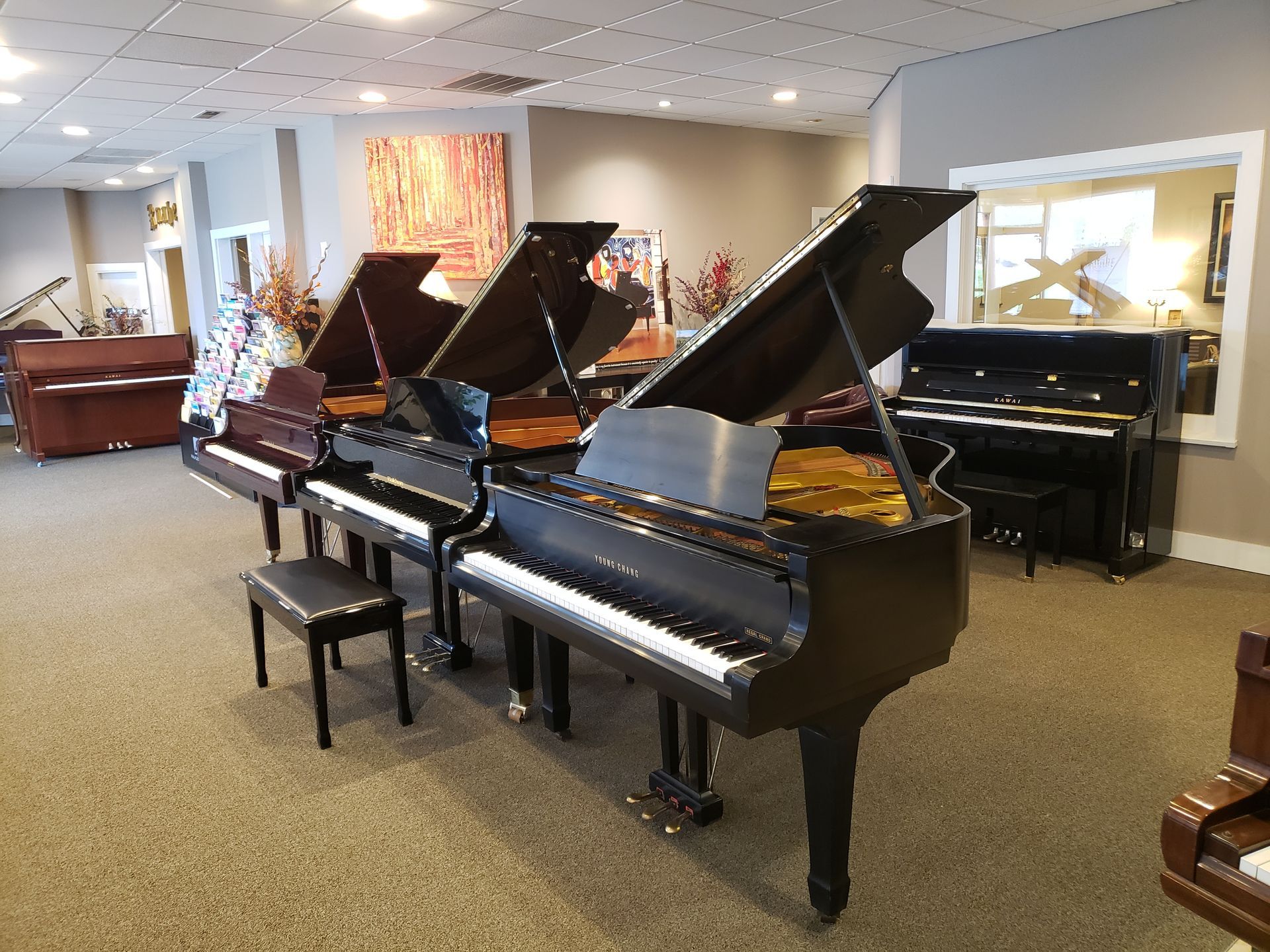 Room with Pianos — Midlothian, VA — Peabodys Piano Co.