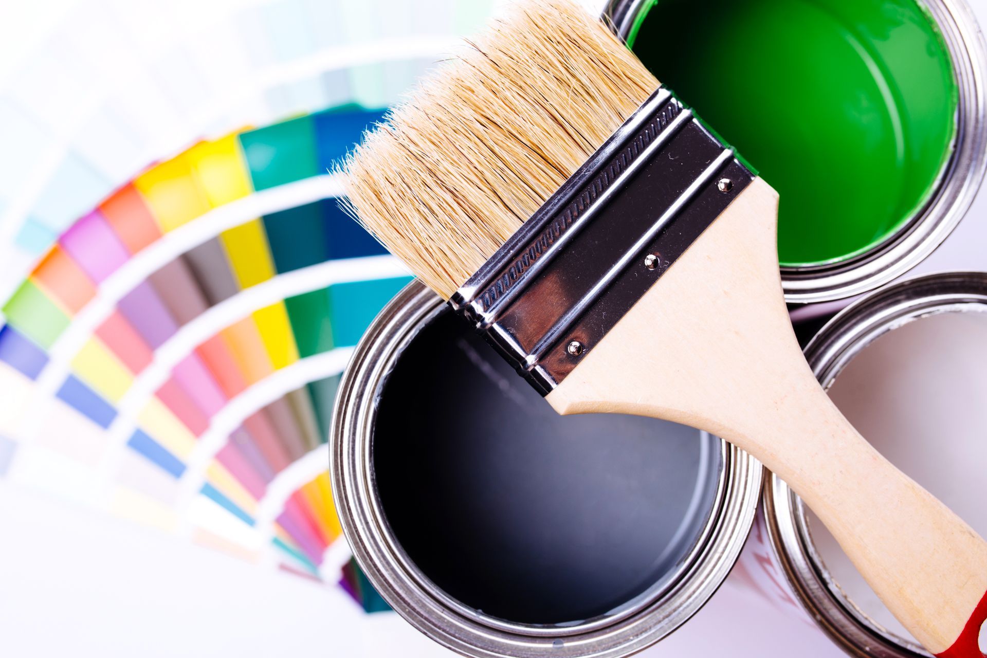 Painter and decorator work table with house project.