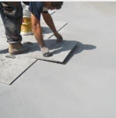 A Man Stamping a Concrete — Ewing, NJ — Pave Patrol, LLC