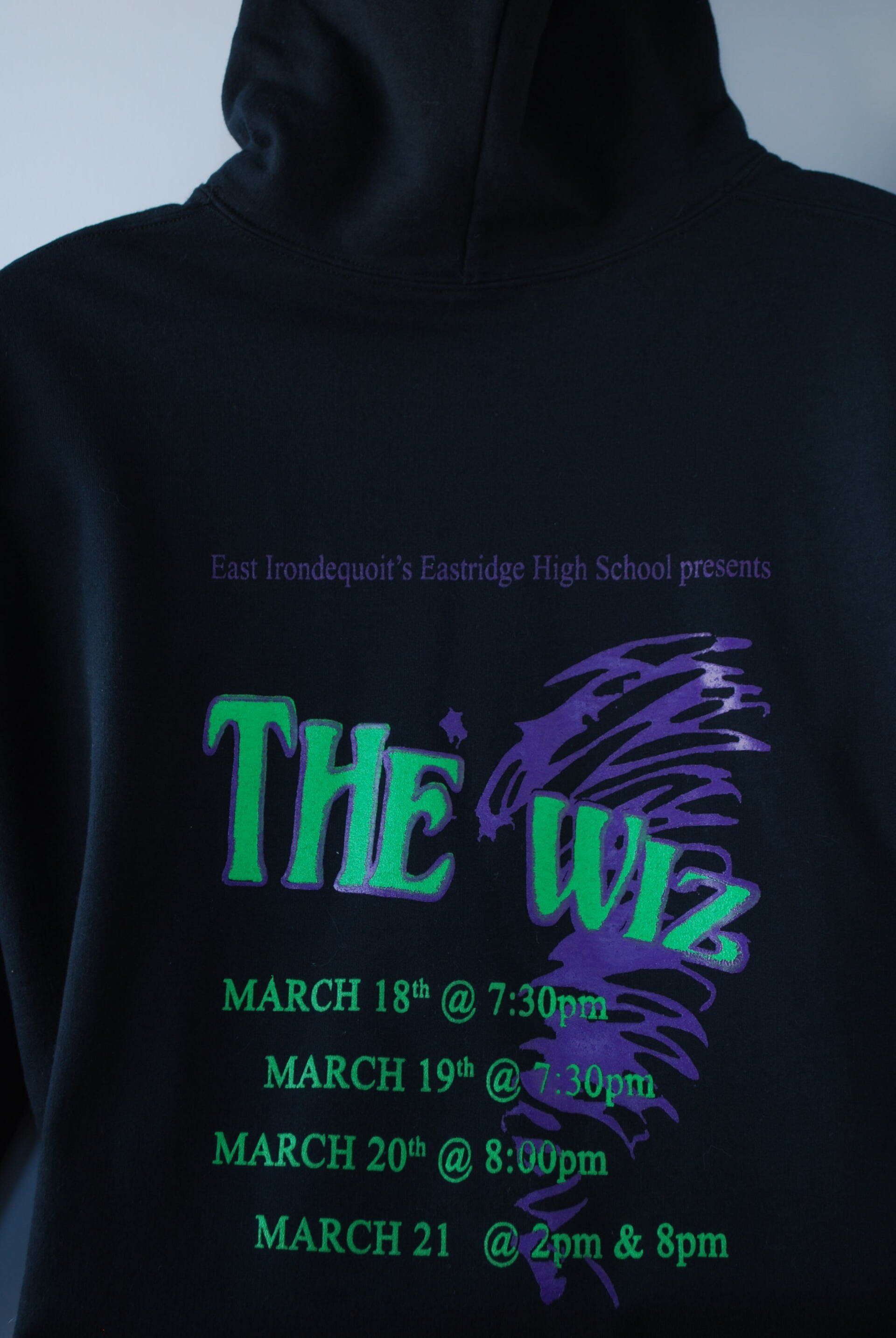 A black hoodie with the words The Wiz on it