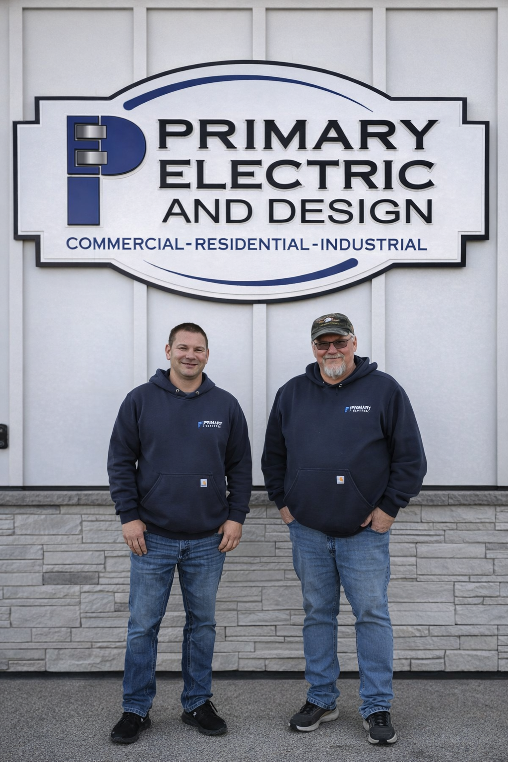 A man and a boy are standing next to each other at a table.