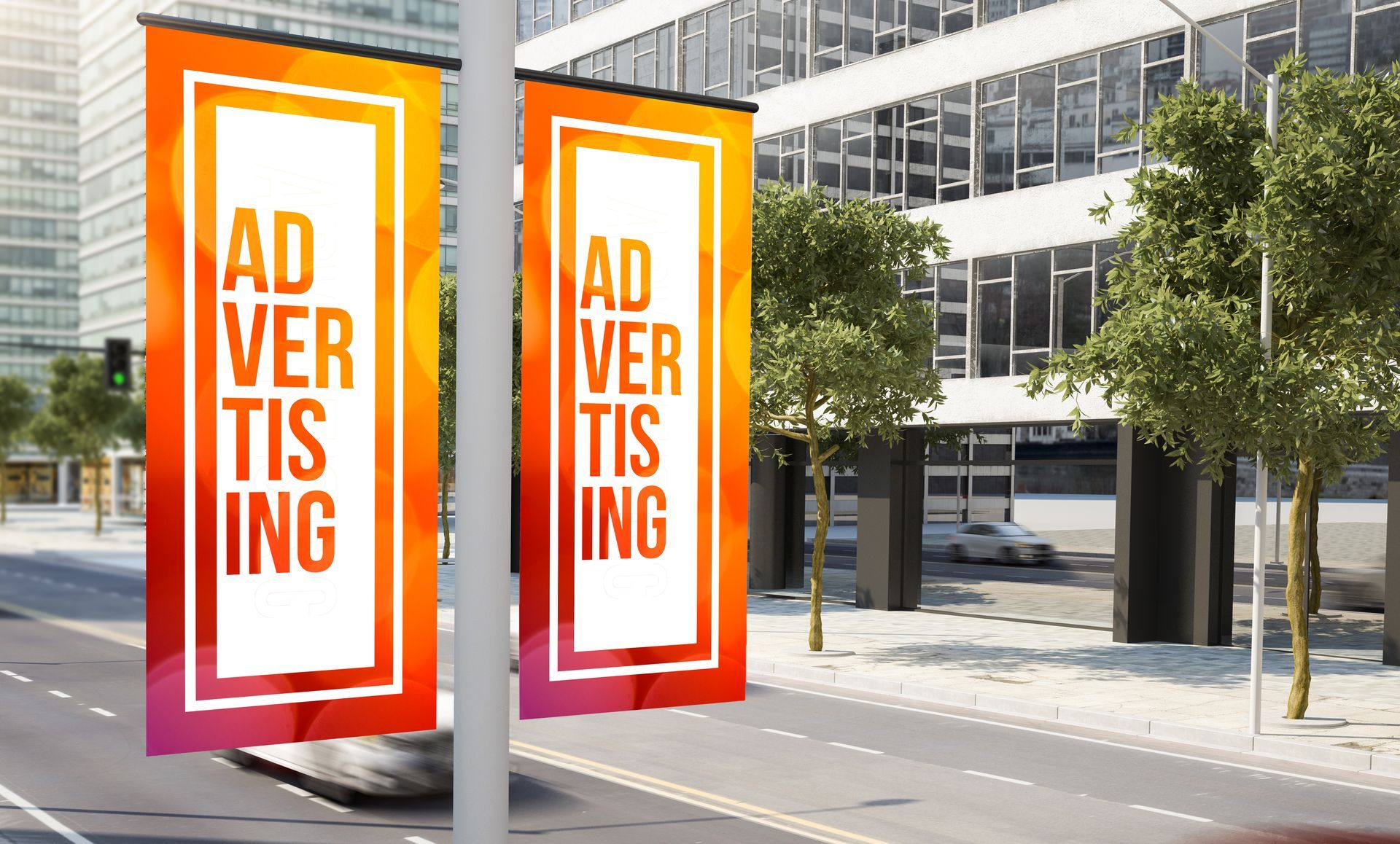 Large format printer printing a colorful graphic on a roll of glossy material.