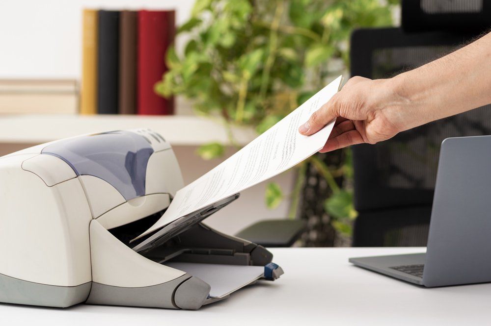 Catching a Document from A Printer — Greensboro, NC — Copy King Printing