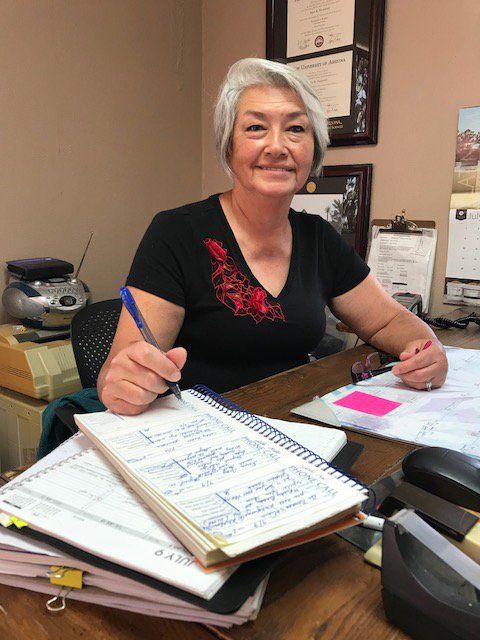 Woman Taking Notes — Chino Valley, AZ  — Los Caballos Veterinary Service