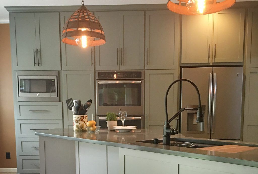 Kitchen With White Cabinets, Granite Countertops, Stainless Steel Appliances, And A Large Island — Willard, MO — Bill’s Custom Woodworks