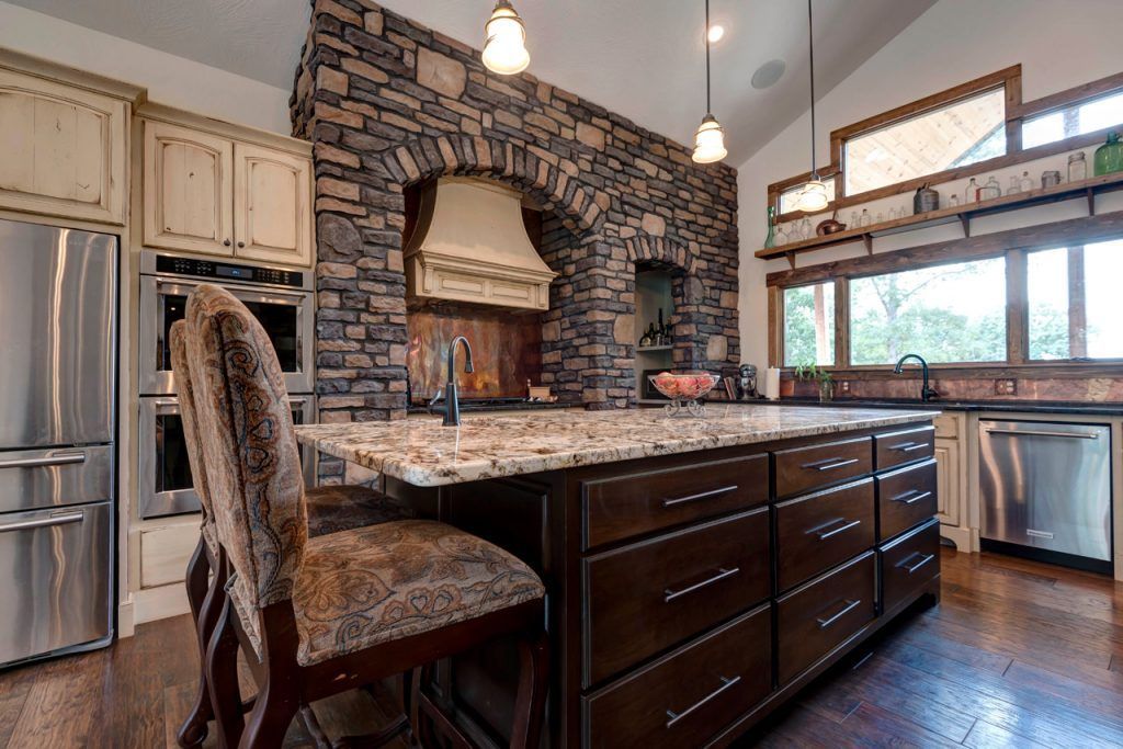 There Is A Large Island In The Middle Of The Kitchen — Willard, MO — Bill’s Custom Woodworks